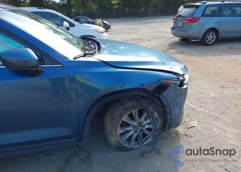 2021 Mazda Cx-5 Grand Touring z USA, uszkodzony, nr VIN JM3KFBDM5M0343058